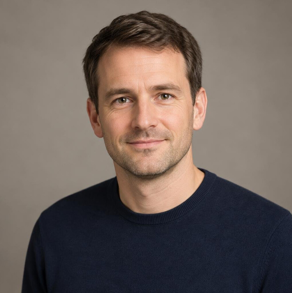 Studio portrait of a man sociologist in a sweater